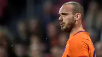 Wesley Sneijder mengonfirmasi keputusan pensiun dari tim nasional Belanda pada usia 33 tahun. (AFP/John Thys)