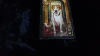 Tarot Hari Ini:  Anjing dalam kartu Gilded Reverie Lenormand melambangkan kesetiaan.