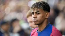 Pemain Barcelona, Lamine Yamal saat laga lanjutan Liga Spanyol 2024/2025 melawan Deportivo Alaves di Estadi Olimpic Lluis Companys, Barcelona, Spanyol, Minggu (02/02/2025) waktu setempat. (AFP/Josep Lago)