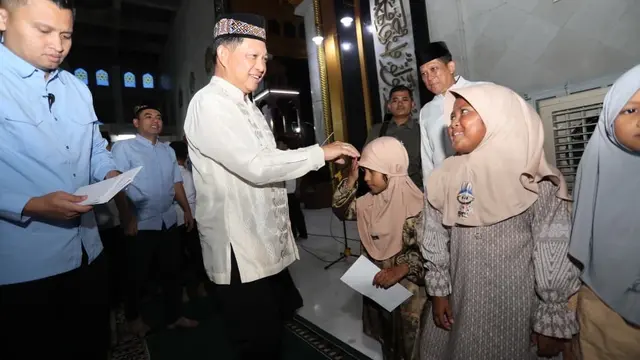 Kasatgas Tito Buka Puasa Bersama Warga Lhokseumawe, Salurkan Bantuan dan Santunan Anak Yatim