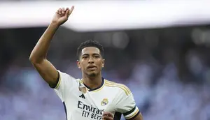 Jude Bellingham mencetak gol pada laga Real Madrid vs Osasuna di La Liga musim 2023/2024 (c) AP Photo/Jose Breton