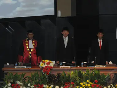 Jokowi dan Ahok menghadiri pelantikan pimpinan DPRD DKI Jakarta, (26/9/14). (Liputan6.com/Herman Zakharia)