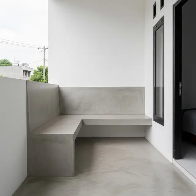 Model Teras Rumah dengan Lantai Semen Polos yang Estetik. (Foto: AI)
