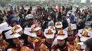 Polisi Cilik bersiap melakukan aksi baris-berbaris  saat CFD di kawasan Budaran HI, Jakarta, Minggu (3/7/2022). Aksi ini dalam rangka memeriahkan HUT ke-76 Bhayangkara. (Liputan6.com/Angga Yuniar)