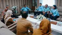 Pertemuan antara perwakilan Pemerintah Kabupaten Kuansing dengan Kanwil Kemenkumham Riau terkait polemik jabatan kepala desa. (Liputan6.com/M Syukur)