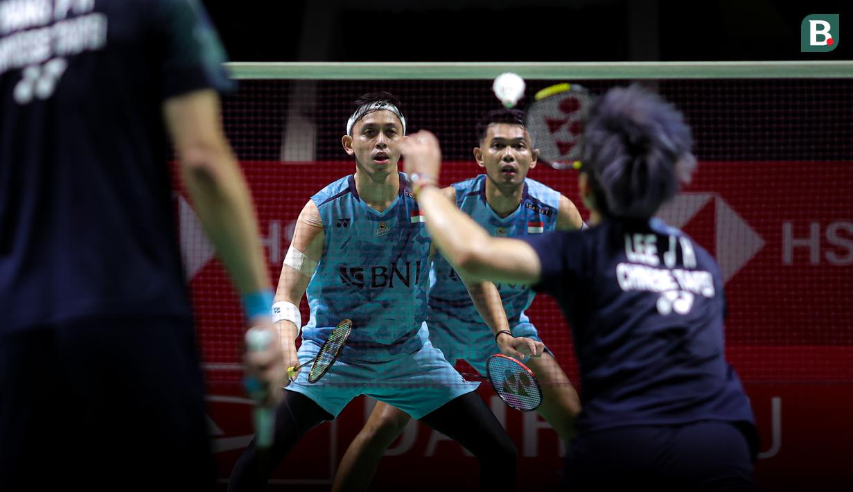 <p>Ganda putra Indonesia, Fajar Alfian/Muhammad Rian Ardianto saat menghadapi pasangan Chinese Taipei pada laga babak 32 besar Daihatsu Indonesia Masters 2024 di Istora Senayan, Jakarta, Selasa (23/1/2024). Fajar Alfian/Muhammad Rian Ardianto menang dua game langsung 21-16, 21-14. (Bola.com/Bagaskara Lazuardi)</p>