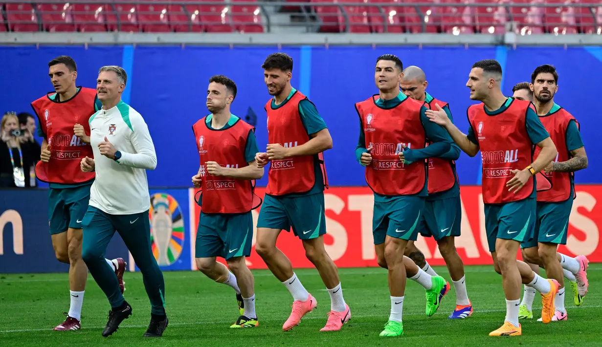 Euro 2024 merupakan kali keenam Cristiano Ronaldo tampil dalam ajang sepak bola empat tahunan di bawah naungan UEFA. (JOHN MACDOUGALL/AFP)