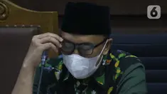 Terdakwa kasus suap dana hibah Kemenpora kepada KONI, Imam Nahrawi saat menjalani sidang lanjutan di Pengadilan Tipikor Jakarta, Rabu (18/3/2020). Sidang lanjutan mantan Menteri Pemuda dan Olahraga Imam Nahrawi ini menyimak keterangan saksi-saksi. (Liputan6.com/Helmi Fithriansyah)