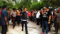 Sekitar 200 tahanan kabur dari Rutan Pekanbaru, Riau, dan lari ke semak-semak sekitar lokasi dan permukiman. (Liputan6.com/M Syukur)