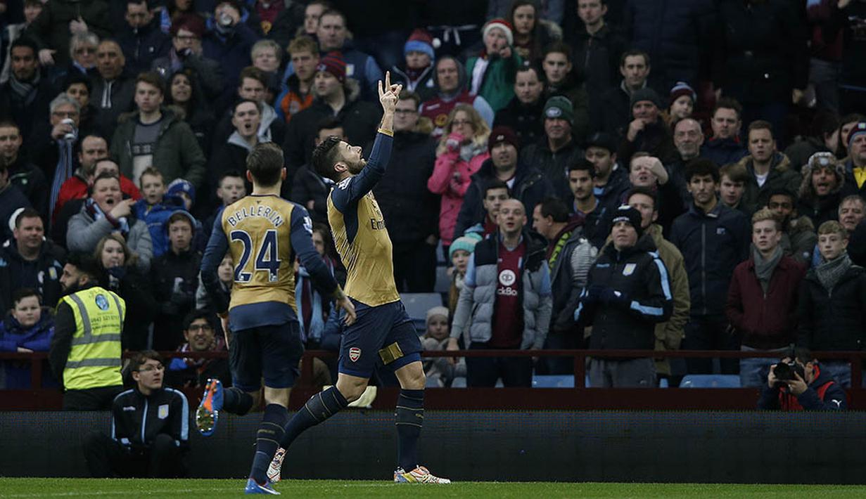 Striker Arsenal, Olivier Giroud, musim ini menampilkan produktivitas mencetak gol yang tinggi dibandingkan musim lalu. (AFP/Adrian Dennis)