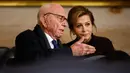 Mantan Ketua Eksekutif Fox Corp, Rupert Murdoch (kiri) dan Elena Zhukova menghadiri upacara pelantikan Donald Trump sebagai Presiden ke-47 Amerika Serikat di US Capitol Rotunda, Washington DC, pada 20 Januari 2025. (Chip Somodevilla/POOL/AFP)