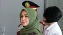 Istri Muda Gubernur Sumatera Utara, Evy Susanti memenuhi panggilan penyidik KPK, Jakarta, Senin (3/8/2015) Gatot diperiksa sebagai tersangka kasus dugaan suap hakim PTUN Medan. (Liputan6.com/Helmi Afandi)
