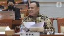 Ketua Komisi Pemberantasan Korupsi (KPK), Firli Bahuri saat mengikuti rapat kerja dengan Komisi III DPR di Kompleks Parlemen, Senayan, Jakarta, Rabu (7/9/2022). Rapat tersebut membahas RKA K/L tahun 2023 dan pembahasan usulan program yang akan didanai oleh DAK. (Liputan6.com/Angga Yuniar)