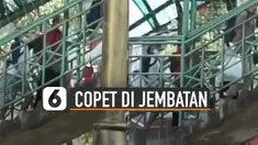 Beredar video aksi copet di jembatan penyeberangan viral di media sosial.