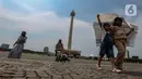 Wisatawan masih memanfaatkan masa libur Lebaran 2024 ini untuk berkunjung ke Monas. (Liputan6.com/Angga Yuniar)