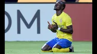 Sadio Mane baru didatangkan Al Nassr dari Bayern Munchen pada awal musim 2023/2024. Saat ini ia berstatus sebagai top skor bersama timnas Senegal dengan catatan 38 gol dari 99 laga. Bersama Al Nassr hingga kini ia telah mencetak 8 gol dan 2 assist dari total 14 laga di semua kompetisi. (AFP/Fayez Nureldine)