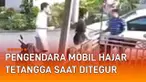 Terekam kamera CCTV, pengendara mobil hajar tetangga saat ditegur karena ngebut di jalan kampung.