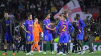 Tersingkir di Liga Europa, Barcelona amat sangat sulit merebut trofi musim ini. Di La Liga, meski menunjukkan tren positif dan melesat ke posisi kedua, Barca sulit mengejar Real Madrid di puncak karena berjarak 12 poin. (AFP/Jose Jordan)