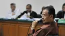  Hambit menjelaskan jika Akil pernah mengatakan perkara sengketa Pilkada Gunung Mas berat (Liputan6.com/Johan Tallo)