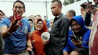 Sandiaga Salahuddin Uno ketika berkunjung ke salah satu pasar di Pekanbaru. (Liputan6.com/M Syukur)