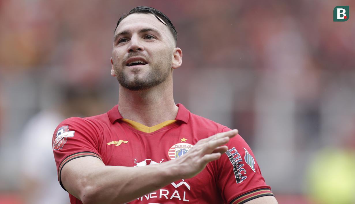 Striker Persija Jakarta, Marko Simic, melakukan selebrasi usai membobol gawang Borneo FC pada laga Shopee Liga 1 di SUGBK, Jakarta, Minggu, (1/3/2020). Persija menang 3-2 atas Borneo FC. (Bola.com/M Iqbal Ichsan)