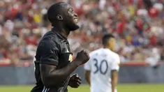 Striker Manchester United, Romelu Lukaku, merayakan gol yang dicetaknya ke gawang Real Salt Lake pada laga persahabatan di Stadion Rio Tinto, Utah, Selasa (17/7/2017). MU menang 2-1 atas Salt Lake. (AP/Rick Bowmer)