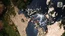 Jangankan untuk berenang dan bermain air, untuk mendekat ke aliran air terjun saja sudah tak bisa lantaran aromanya yang menusuk hidung. (merdeka.com/Imam Buhori)
