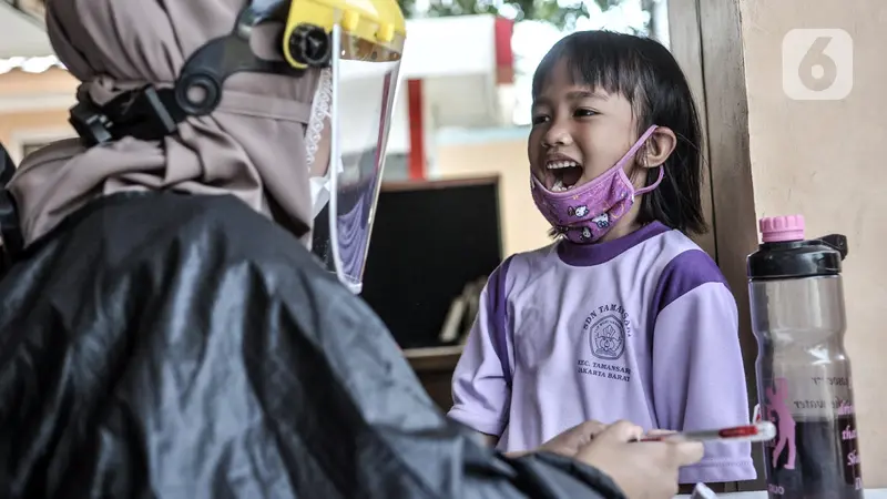 FOTO: Imunisasi Anak Sekolah di Masa Pandemi COVID-19