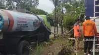 Proses penditribusian air bersih di kawasan Kecamatan Wongsorejo Banyuwangi (Istimewa)