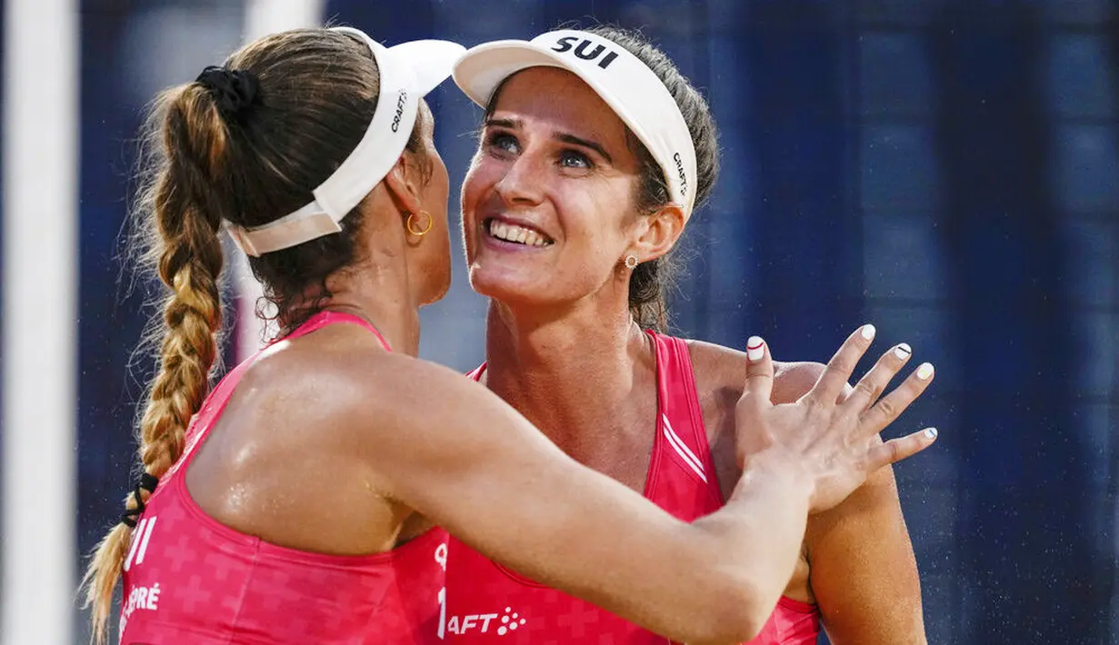 Joana Heidrich - Atlet asal Swiss ini tidak hanya handal dalam permainan voli pantai. Parasnya yang cantik sering membuatnya menjadi sorotan. (Foto: AP/Petros Giannakouris)