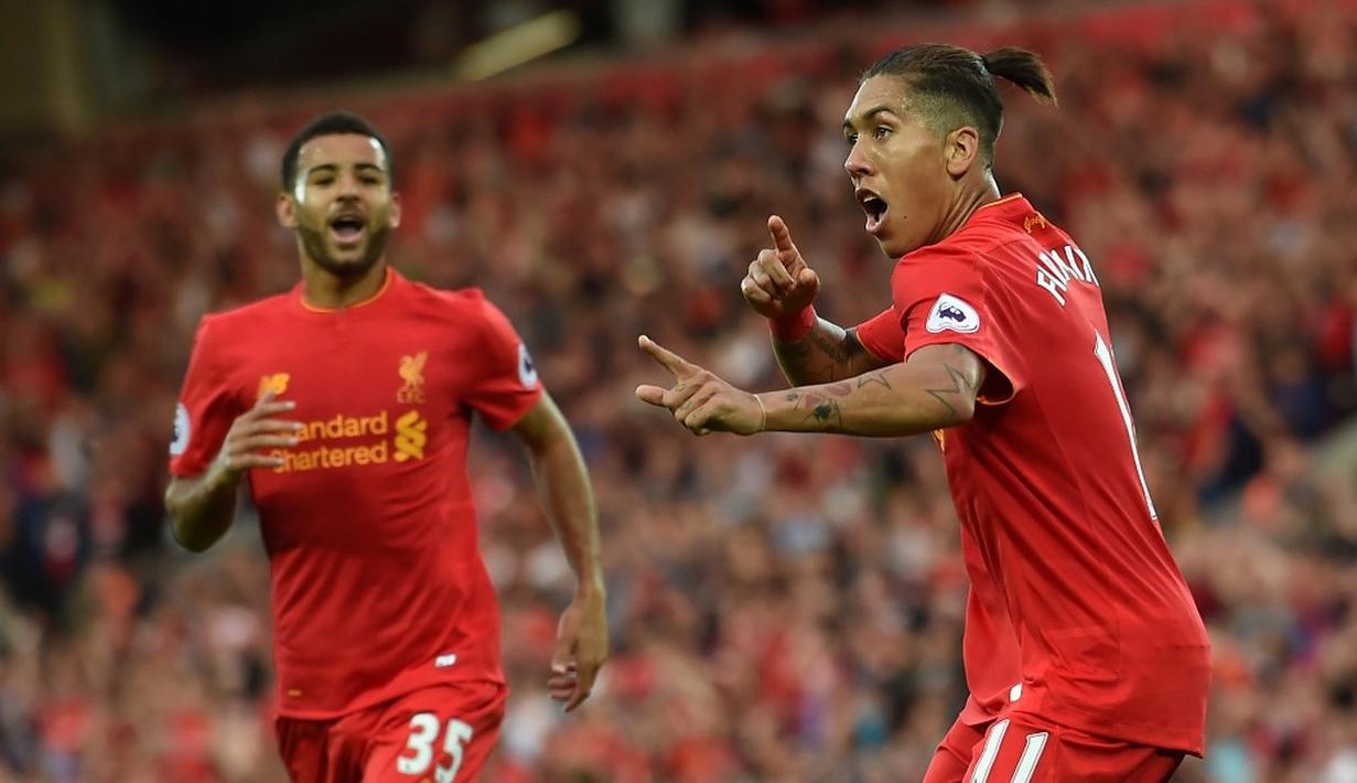 Liverpool menaklukkan juara bertahan Premier League, Leicester City, 4-1, dalam laga yang berlangsung di Stadion Anfield, Sabtu (10/9/2016). Roberto Firmino mencetak dua gol. (AFP/Paul Ellis)