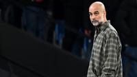 Manajer Manchester City asal Spanyol, Pep Guardiola, bereaksi selama pertandingan leg kedua babak 16 besar Liga Champions UEFA antara Manchester City dan Real Madrid di Stadion Etihad di Manchester, barat laut Inggris, pada 18 Maret 2026.
(Paul ELLIS/AFP)