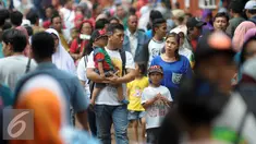 Pengunjung memadati Taman Marga Satwa Ragunan, Jakarta, Jumat (6/5) Ragunan merupakan salah satu destinasi liburan favorit warga Jakarta dan sekitarnya. (Liputan6.com/Helmi Afandi)