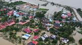 Foto udara menunjukkan area permukiman yang terendam banjir di Kangar, negara bagian Perlis, Malaysia utara, pada Kamis 27 November 2025. Hingga Kamis 27 November 2025, negara bagian utara dan timur Malaysia masih digenangi banjir parah. (Mohd RASFAN/AFP)