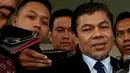 Kepala Pusat Pelaporan dan Analisis Transaksi Keuangan (PPATK) Muhammad Yusuf langsung diserbu wartawan usai keluar dari gedung KPK, Jakarta, Kamis (23/10/2014) (Liputan6.com/Miftahul Hayat) 