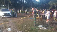 Kepolisian Polda Gorontalo tengah melakukan olah TKP kematian RF, ajudan Pimpinan Polda Gorontalo (Arfandi Ibrahim/Liputan6.com)