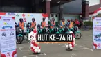 BUMN merayakan Hari Kemerdekaan di kota Banda Aceh. Upacara juga diisi dengan pemberian bantuan serta lomba yang diikuti warga.