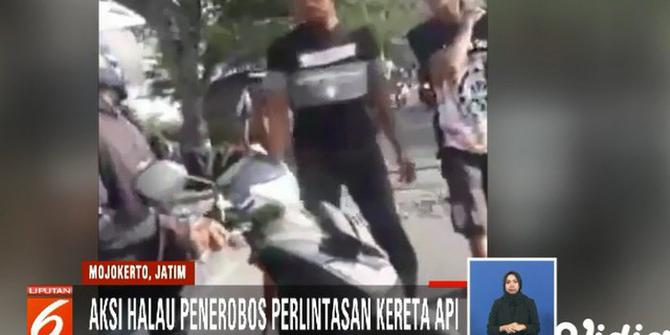 Viral, 2 Pemuda Halau Pengemudi Motor yang Terobos Perlintasan KA