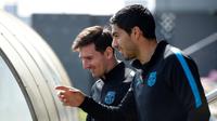 Dua striker Barcelona, Lionel Messi dan Luis Suarez. (AFP/Lluis Gene)