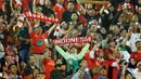 Suasana Stadion Pakansari, Kabupaten Bogor hampir penuh dan terus menggema sepanjang laga. Para pendukung bernyanyi untuk mendukung Timnas Indonesia kontra Curacao. (Bola.com/M Iqbal Ichsan)
