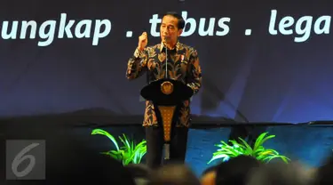 Presiden Joko Widodo (Jokowi) memberikan sambutan saat farewell atau perpisahan dengan program pengampunan pajak atau tax amnesty di Jakarta, Selasa (28/2). Penerimaan tax amnesty hingga hari ini telah mencapai Rp 112 triliun.(Liputan6.com/Angga Yuniar) 