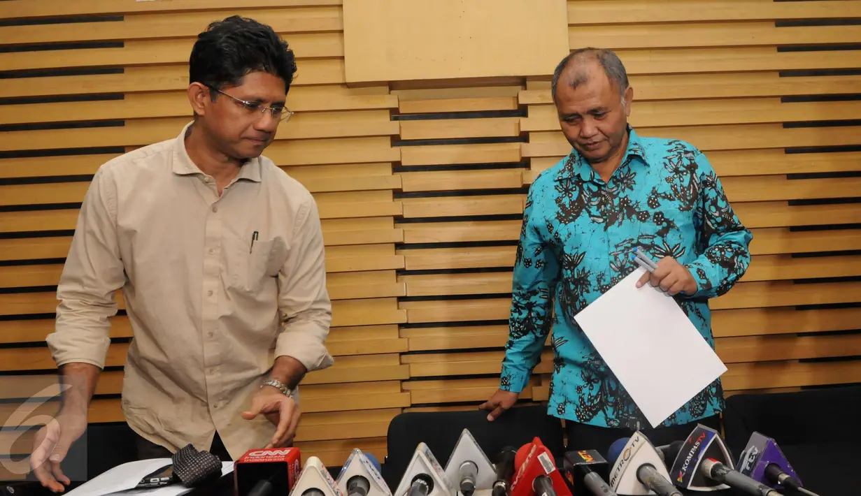 Pimpinan KPK, Agus Rahardjo (tengah) bersama Wakil Pimpinan KPK, Laode M Syarif (kiri) bersiap menggelar konferensi pers terkait suap pengadaan 50 mesin pesawat Garuda Indondesia, Jakarta, Kamis (19/1).  (Liputan6.com/Helmi Afandi)