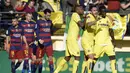 Para pemain Villarreal merayakan gol penyeimbang ke gawang Barcelona pada laga La Liga Spanyol di Stadion El Madrigal, Vila-real, Minggu (20/3/2016). Sempat tertinggal 0-2, Villarreal bangkit samakan kedudukan. (AFP/Jose Jordan)