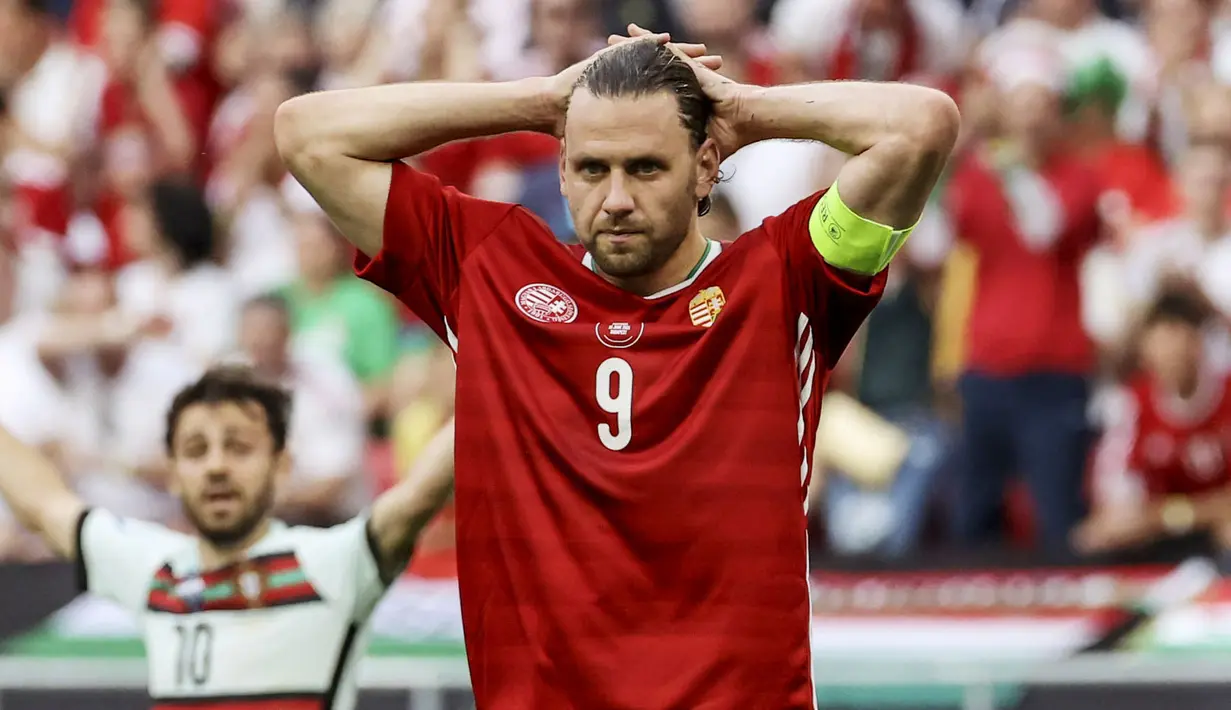 Petaka bagi Hungaria benar-benar terjadi pada menit 84, Portugal akhirnya mampu membobol gawang Hungaria melalui Raphael Guerreiro. (Bernadett Szabo/Pool via AP)