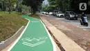 Jalur sepeda di kawasan Taman Semanggi, Jakarta, Kamis (13/10/2022). Usai diresmikan Gubernur DKI Jakarta Anies Baswedan pada acara soft launching 12 Oktober 2022 kemarin, penataan ulang kawasan Taman Semanggi dilanjutkan karena realisasi pengerjaan baru mencapai 73,37 persen. (Liputan6.com/Johan Tallo)