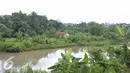 Sebagian lahan Waduk Brigif yang masih terkendala pembebasan lahan sehingga molor pembangunannya mundur dari jadwal semula, Jakarta, Selasa (15/11). Pemprov DKI targetkan pengerukan Waduk Brigif rampung akhir tahun ini. (Liputan6.com/Yoppy Renato)