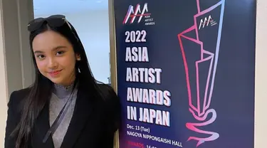 Lyodra Ginting diketahui menghadiri acara penghargaan Asia Artist Awards AAA 2022 di Jepang. Melalui media sosial, Lyodra juga turut mengunggah momen mulai dari keberangkatan hingga berada di belakang panggung. (Liputan6.com/Twitter/@MylyodraOfc)