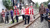 Presiden RI Joko Widodo (Jokowi) meresmikan dimulainya pembangunan jalur ganda (double track) kereta api Bogor-Sukabumi Tahap I, Jumat (15/12/2017). (Ilyas/Liputan6.com)