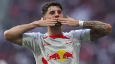 Liverpool baru saja secara resmi mendatangkan gelandang serang Hongaria yang bermain di Liga Jerman bersama RB Leipzig, Dominik Szoboszlai menjelang musim 2023/2024 bergulir. Sebelumnya, Liverpool juga pernah mendatangkan beberapa pemain dari Liga Jerman untuk memperkuat skuad The Reds. Termasuk Dominik Szoboszlai, berikut ini daftar 5 pembelian terakhir Liverpool yang didatangkan dari Liga Jerman. (AFP/Ronny Hartmann)