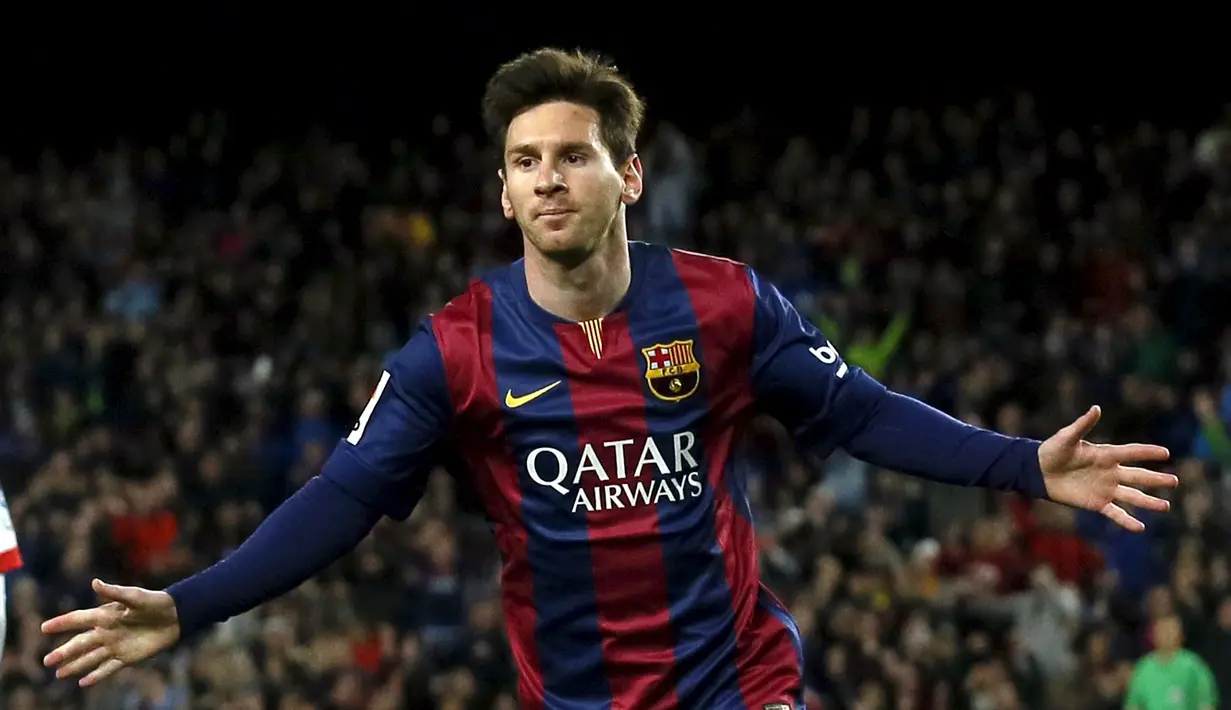 Selebrasi Lionel Messi ketika membuka keunggulan Barcelona saat berhadapan dengan Almeria, di Stadion Camp Nou, Kamis (9/4/2015) dini hari WIB. (REUTERS/Albert Gea)